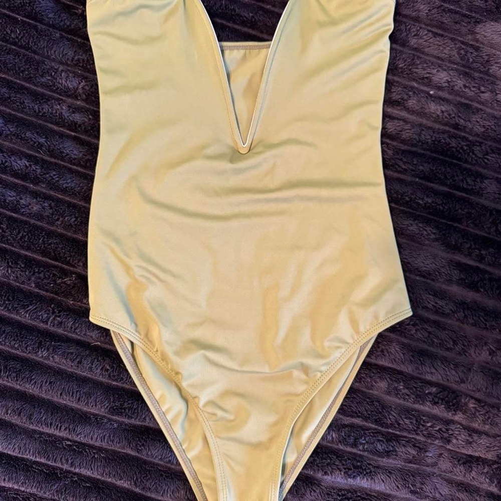 Green one piece bodysuit. Can be worn as a bodysuit. - Picture 1 of 3